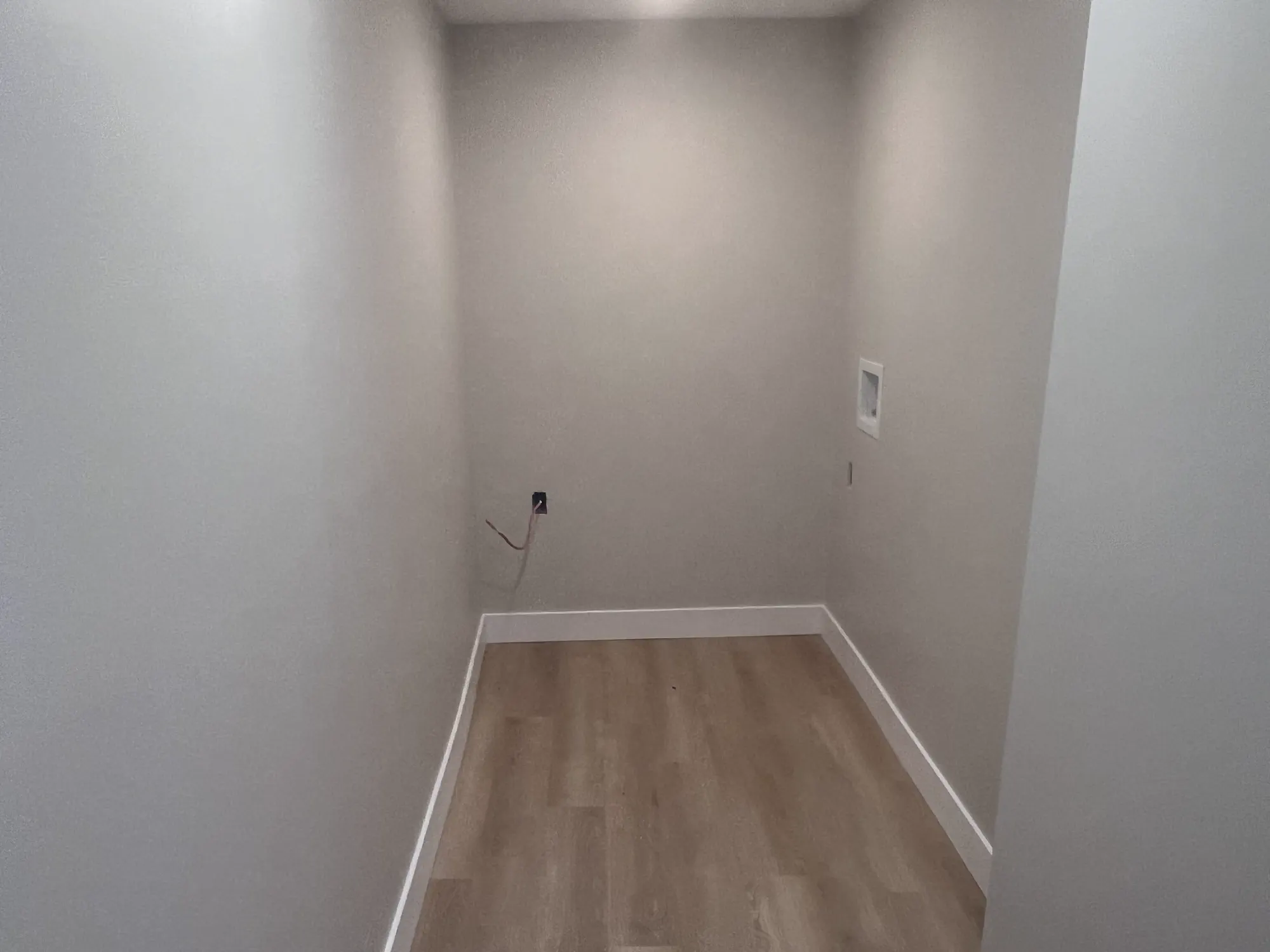 Kitchen walls and cabinet openings before the renovation is complete